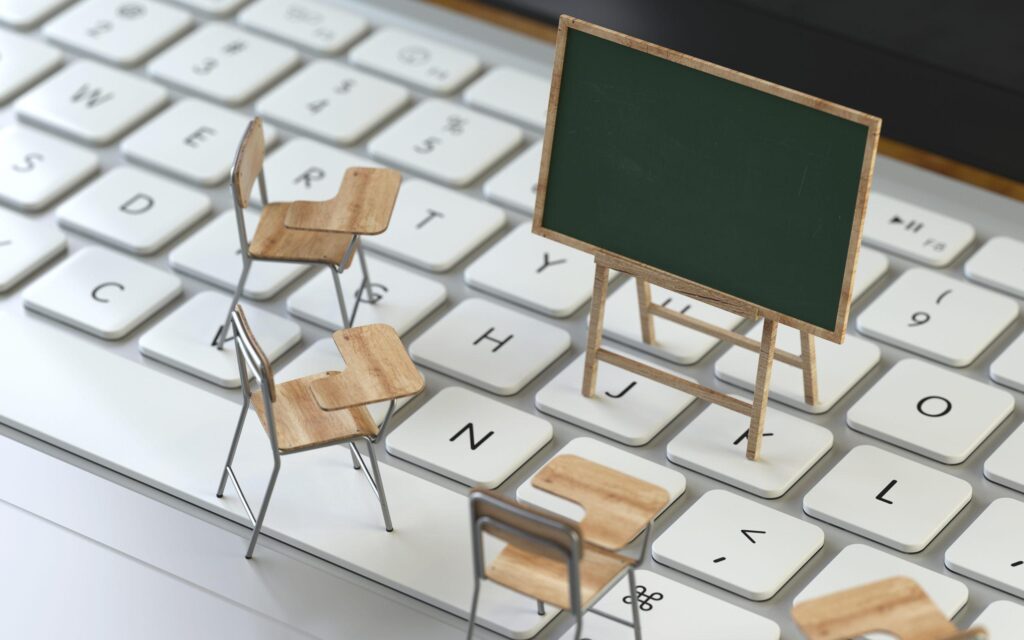 floor looks like a keyboard with chairs and a blackboard - Learning builds capacity
